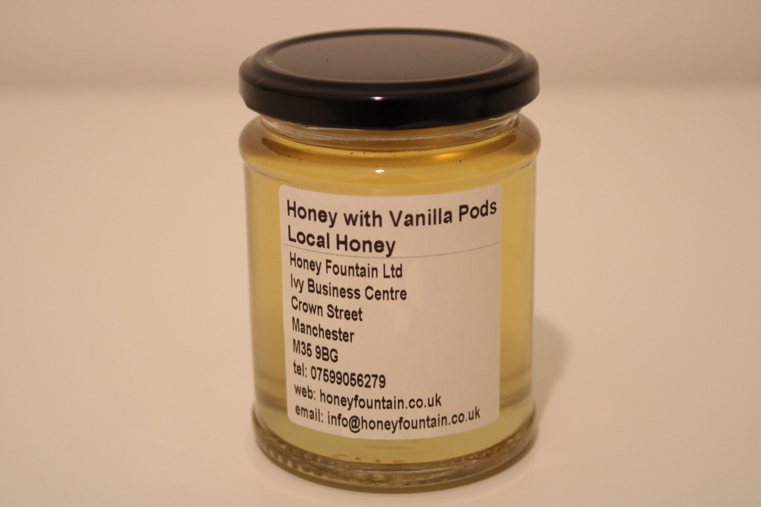 Honey with Vanilla - 345g Glass Jar 345g glass jar of local honey infused with natural vanilla beans, label clearly visible