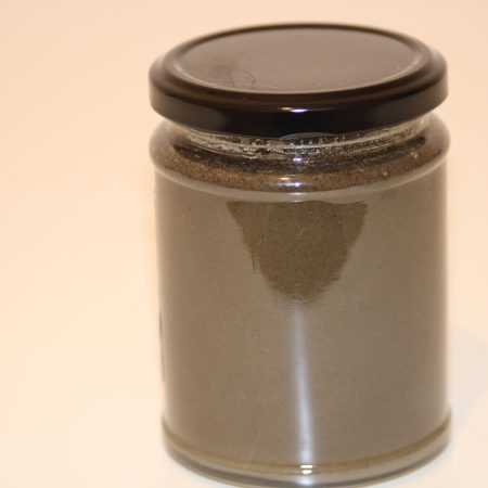 345g glass jar of raw honey blended with black seeds (Nigella sativa), label visible