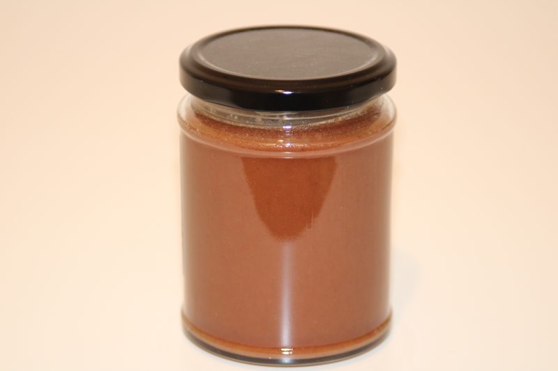 345g glass jar of raw honey blended with natural cocoa powder, label visible