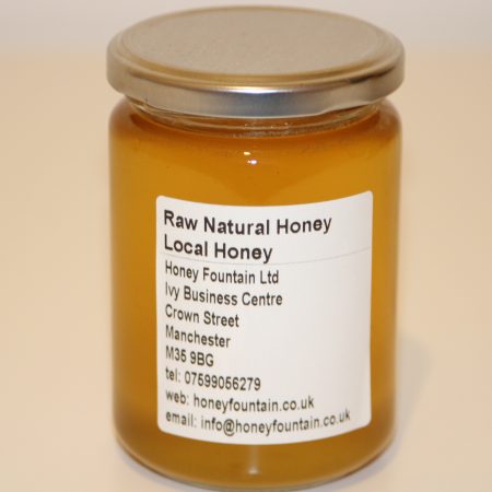 475g glass jar of locally sourced filtered honey with clear label and golden honey visible